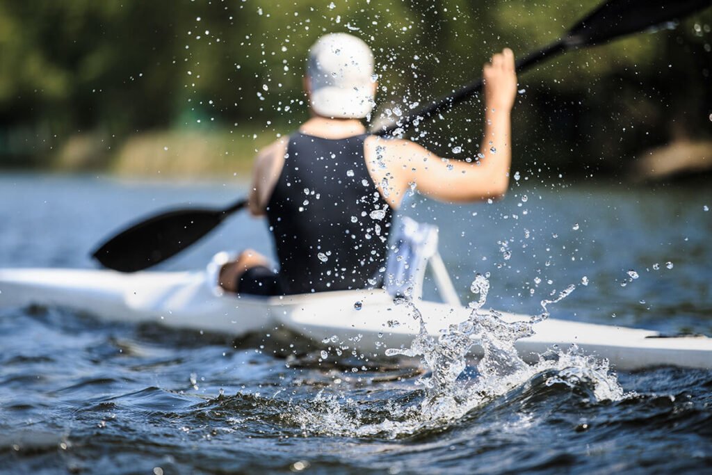 Athlete rowing kayak athlete rowing kayak