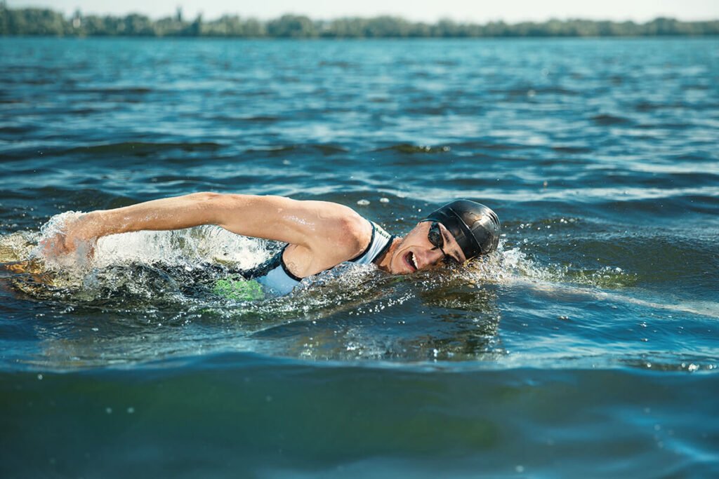 Professional triathlete swimming in river professional triathlete swimming in river 39 s ope